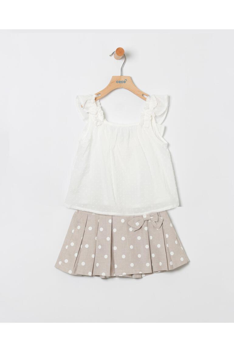 Conjunto niña blusón plumeti blanco y falda topos tostado - Coco Acqua 2025