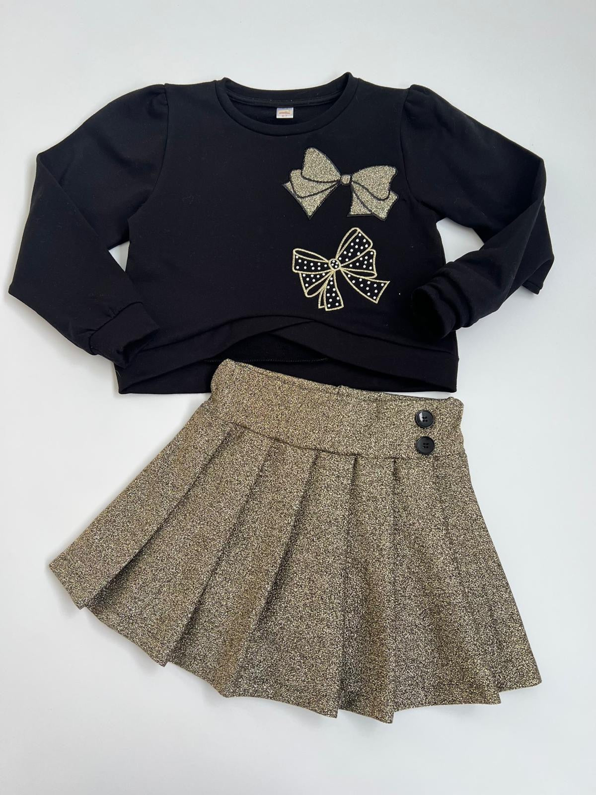 Conjunto de niña con falda color dorado