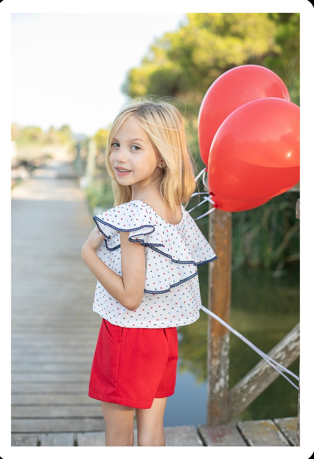 Conjunto niña blusón plumeti y short rojo - Coco Acqua 2025