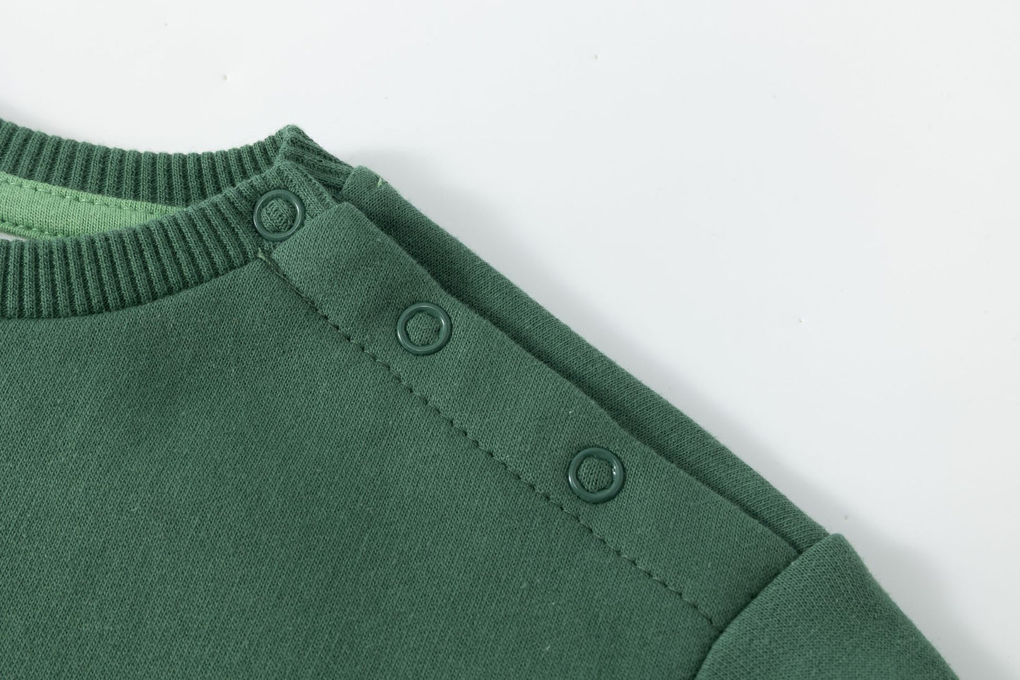 Sudadera bebé dinosaurio en verde - Newness invierno