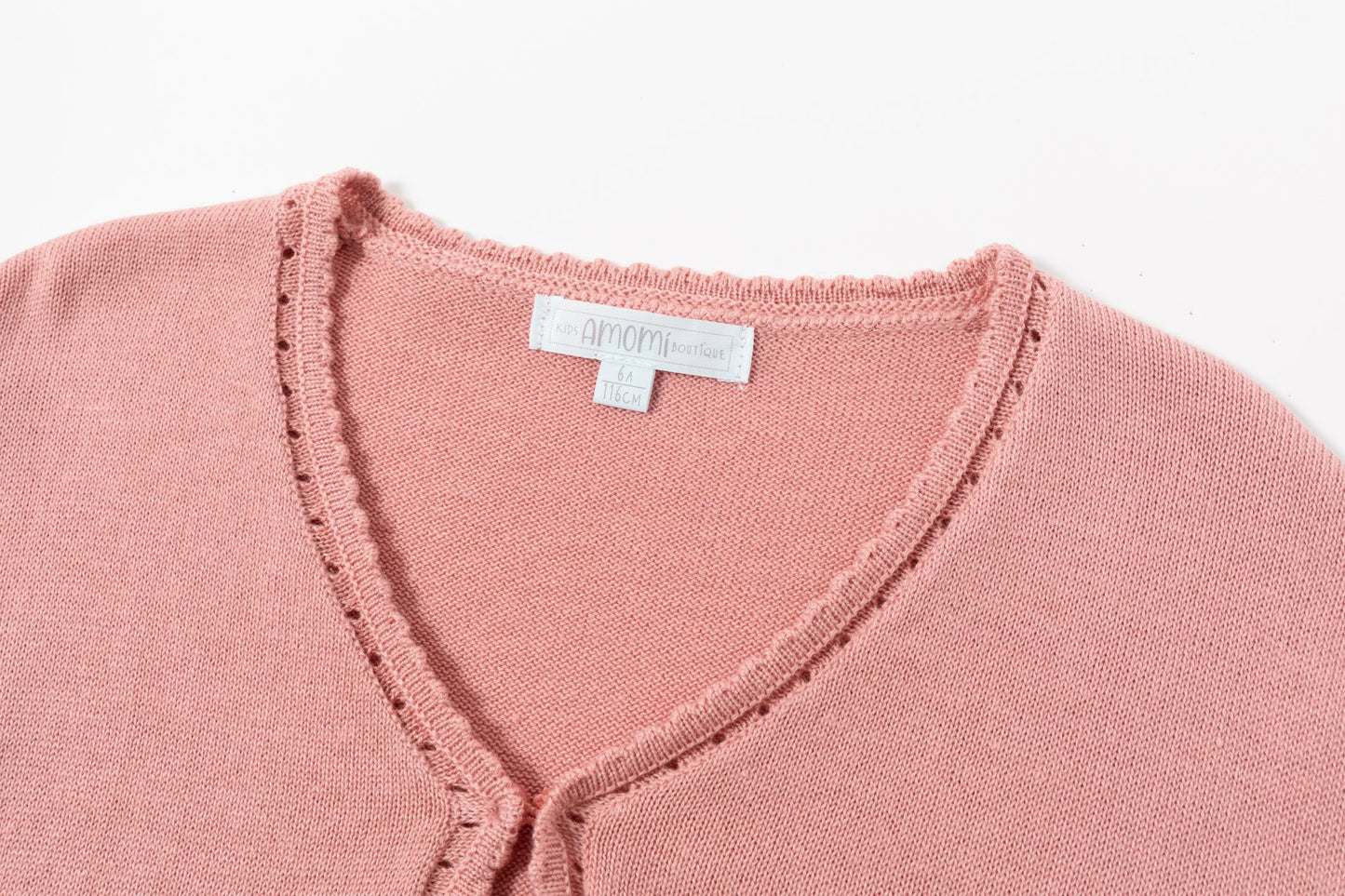 Chaqueta torera de niña en punto, de color rosa maquillaje de Newness - Detalle 2 - Moda Infantil Chicle