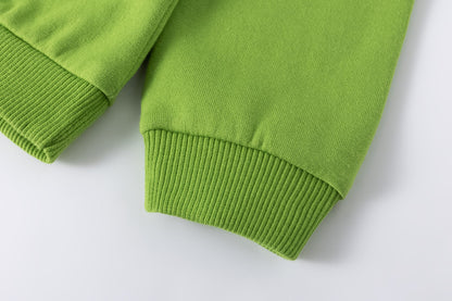 Sudadera bebé en pistacho con robot azul - Newness invierno 2024