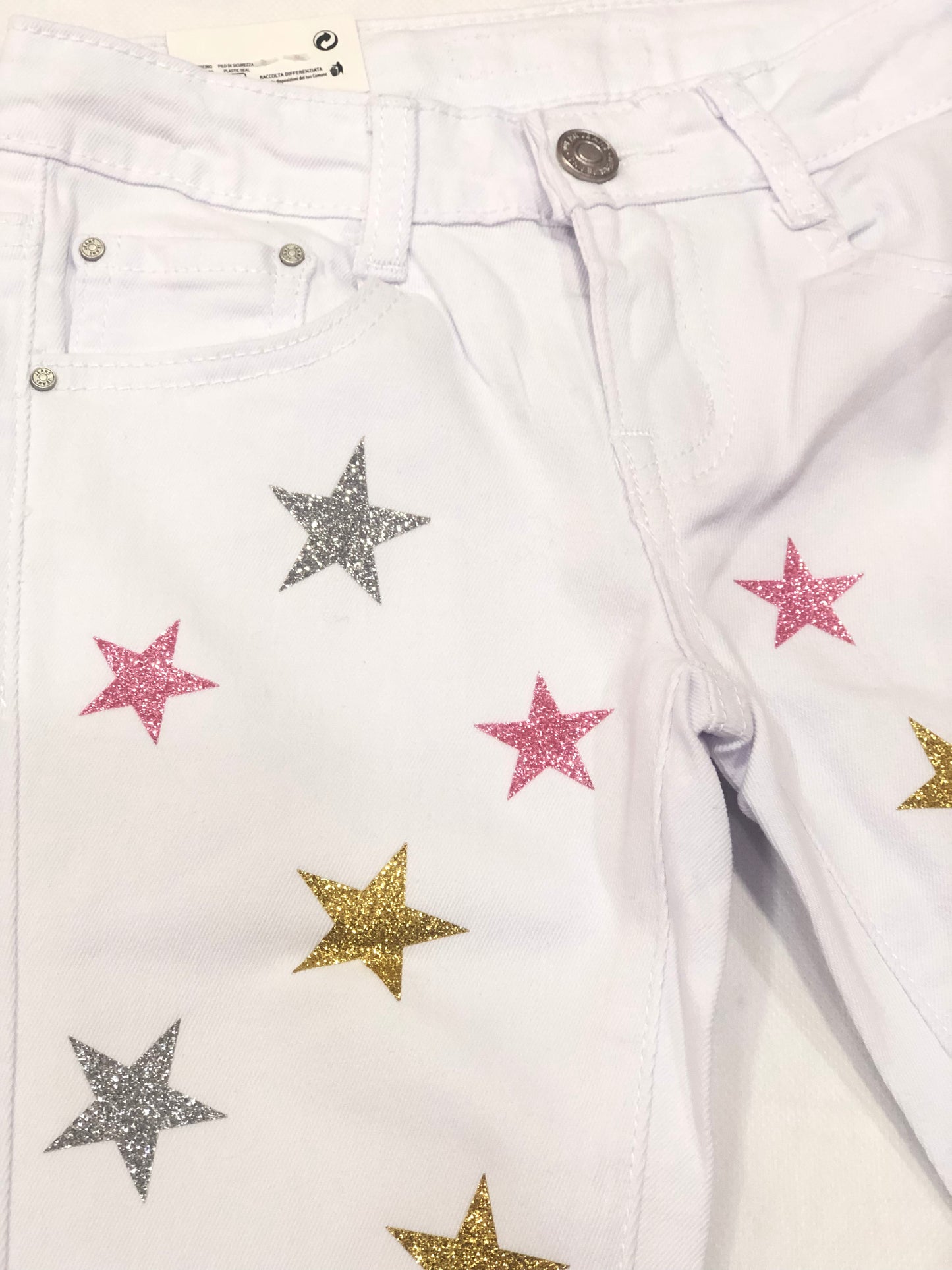 Pantalón de niña en color blanco con estrellas