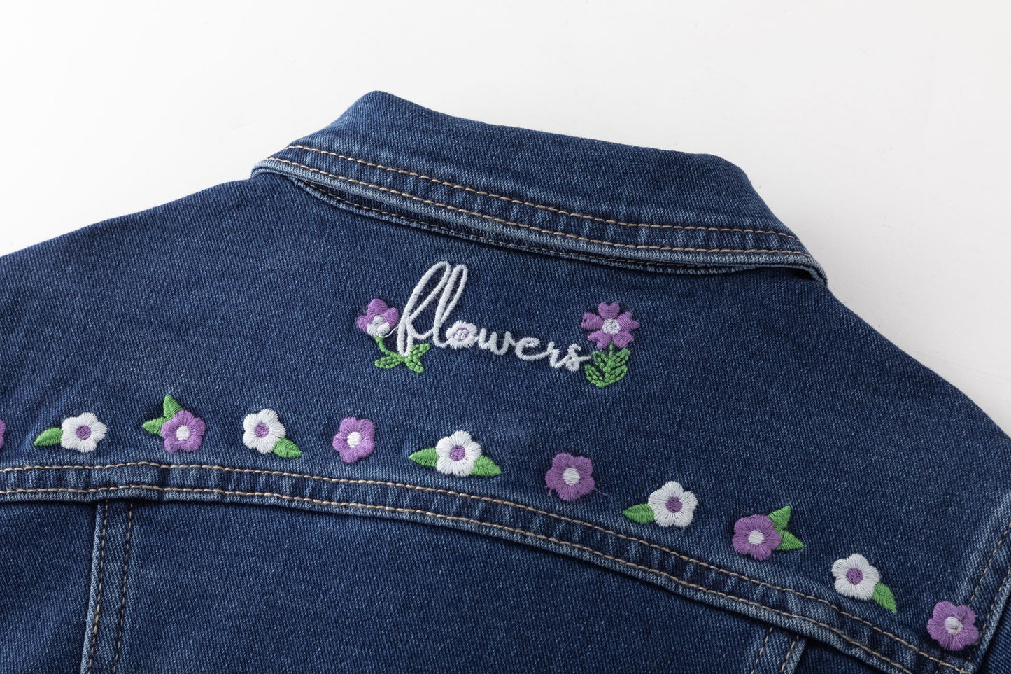 Cazadora vaquera con flores por delante y detrás - Newness