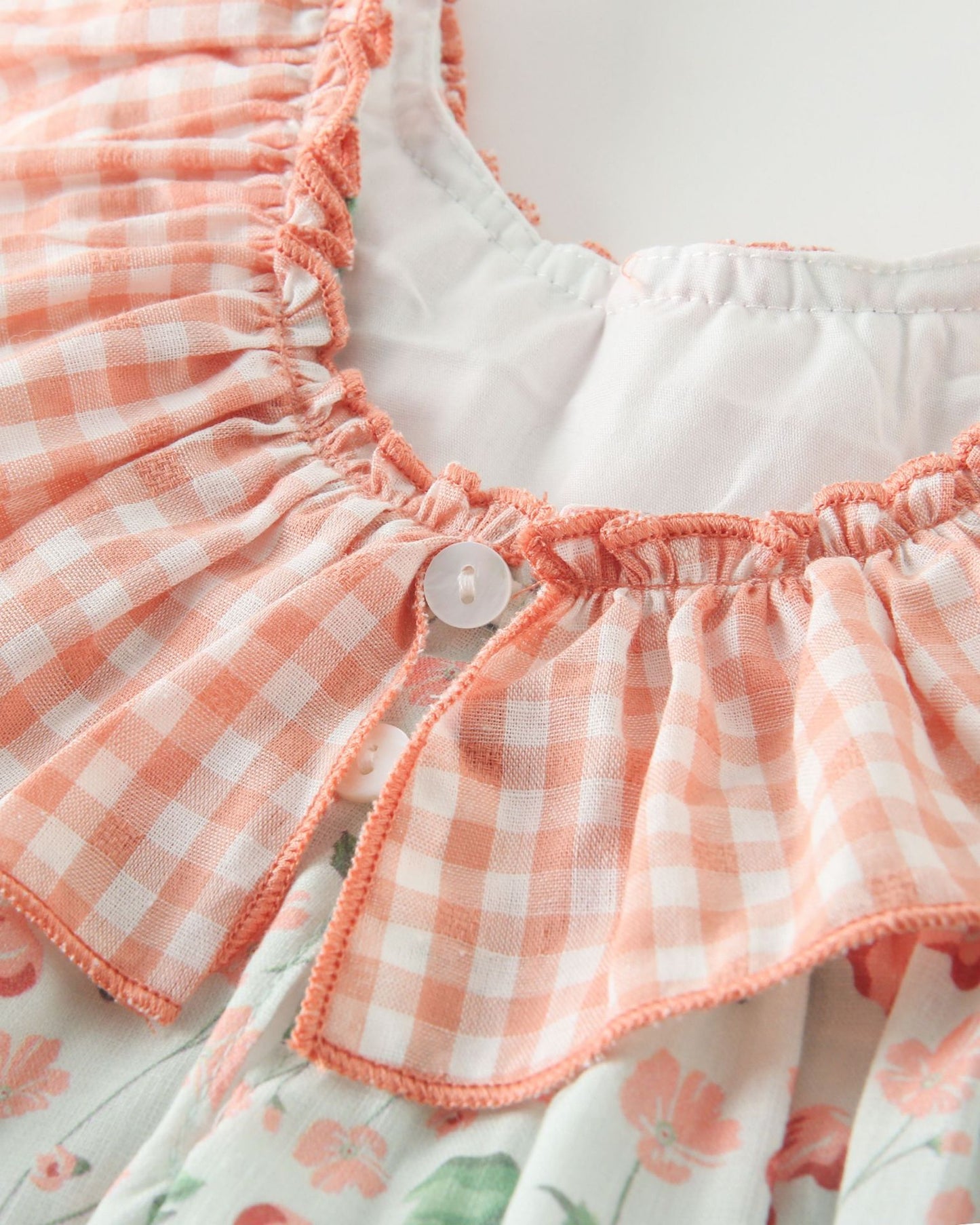 Vestido niña florar anaranjado - Newness