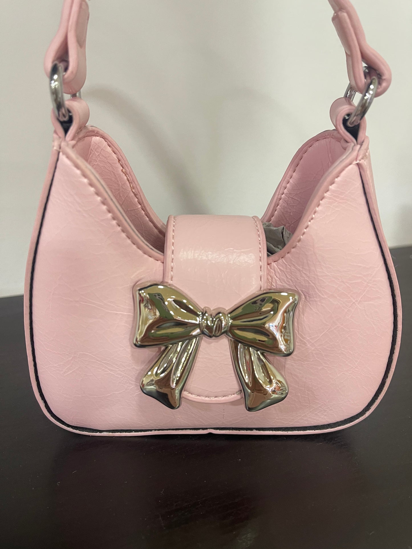 Bolso de niña en rosa, con lazo