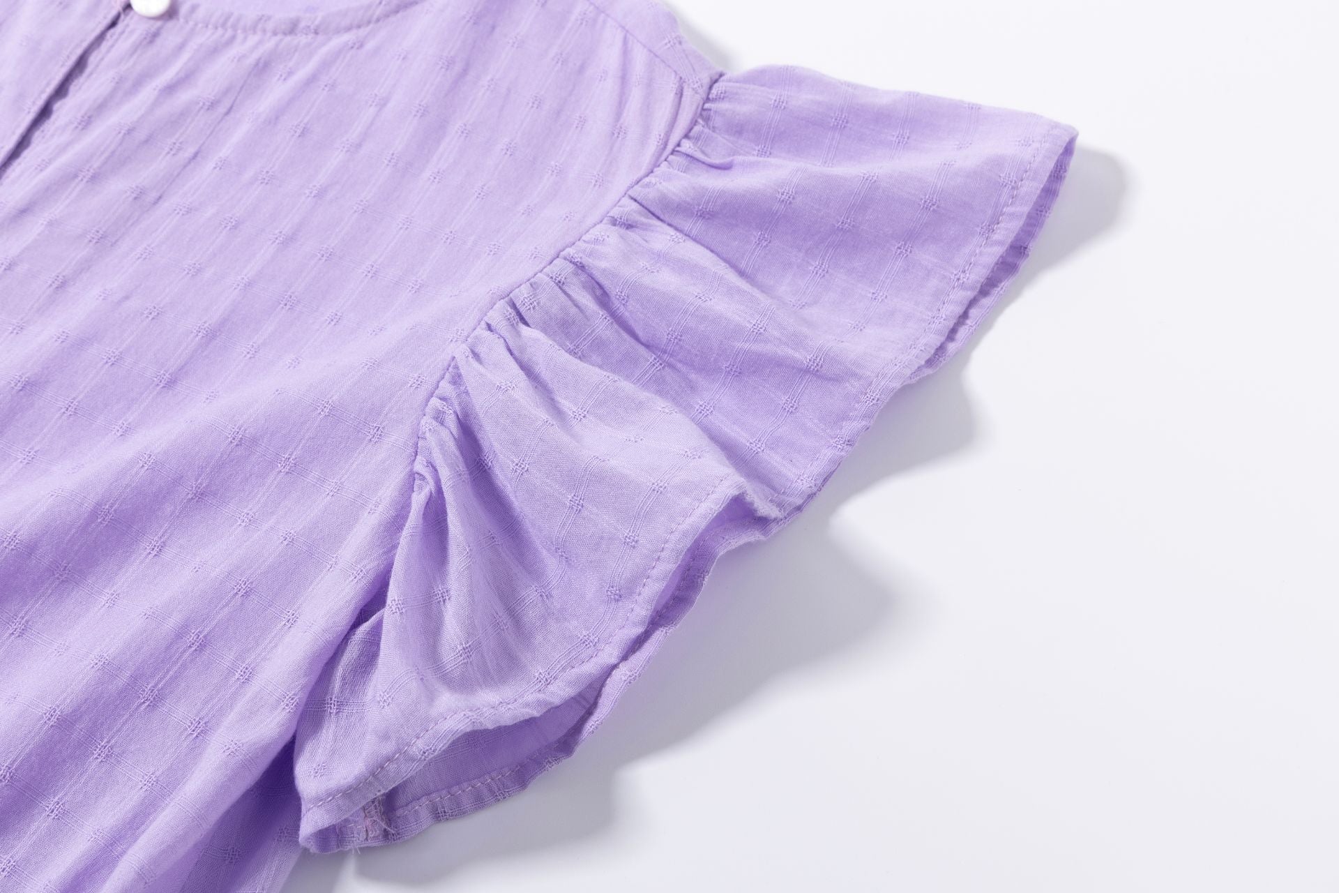 Blusón de niña en morado en color morado - Newness - Detalle 4 - Moda Infantil Chicle