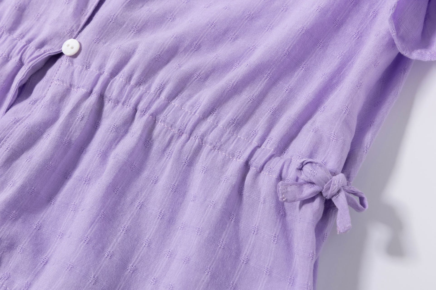 Blusón de niña en morado en color morado - Newness - Detalle 7 - Moda Infantil Chicle
