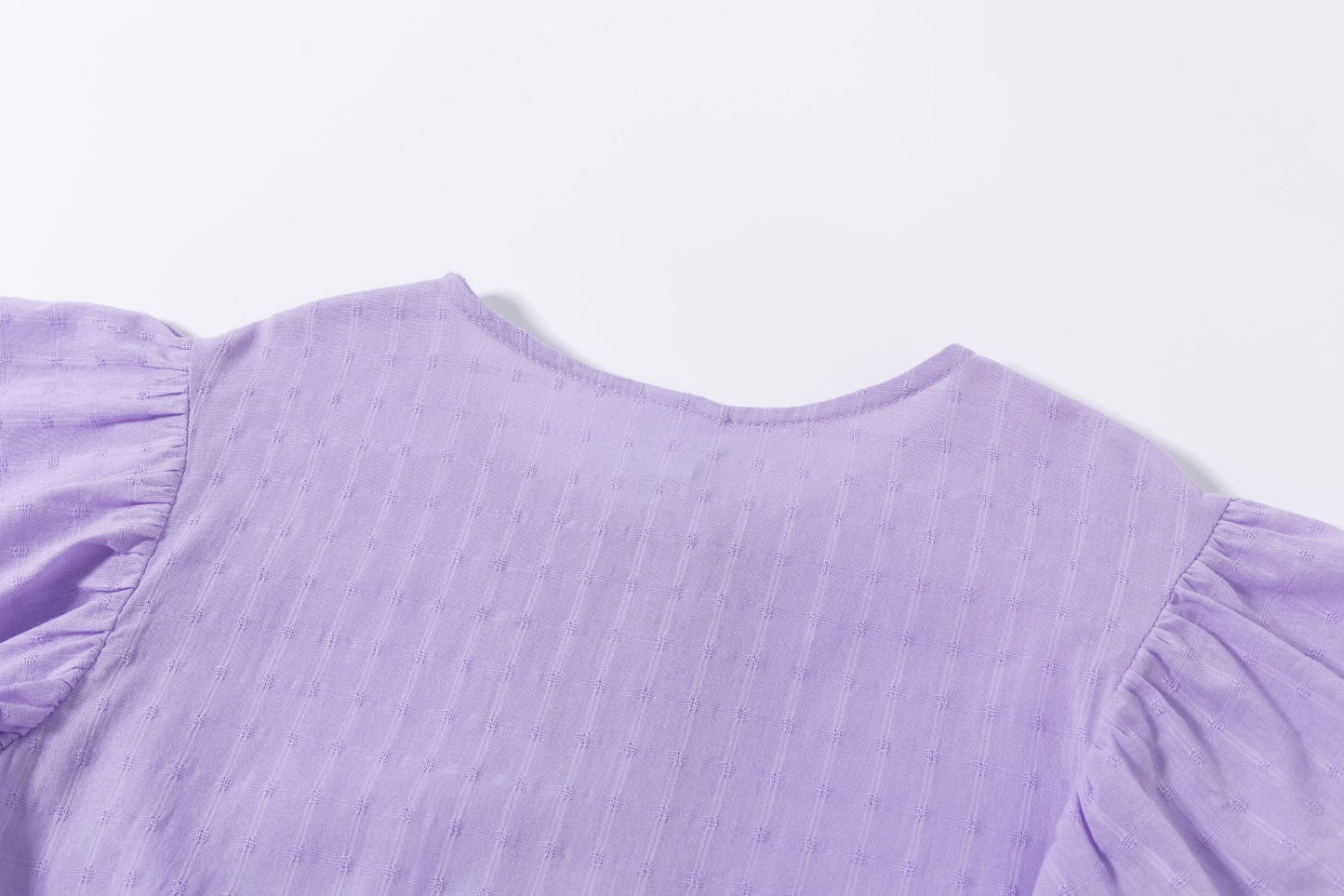 Blusón de niña en morado en color morado - Newness - Detalle 8 - Moda Infantil Chicle