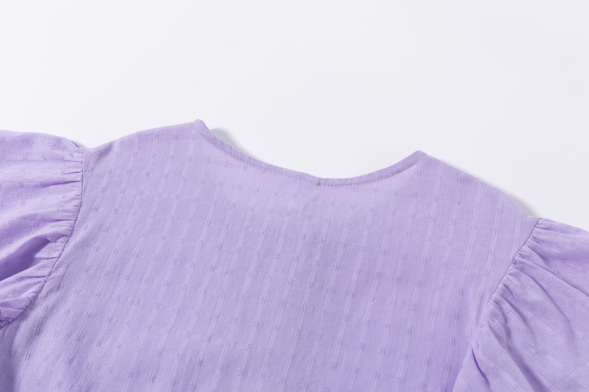 Blusón de niña en morado en color morado - Newness - Detalle 8 - Moda Infantil Chicle