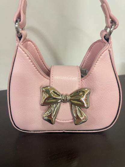 Bolso de niña en rosa, con lazo - Detalle 1 - Moda Infantil Chicle