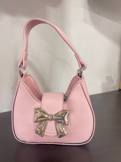 Bolso de niña en rosa, con lazo - Frontal - Moda Infantil Chicle