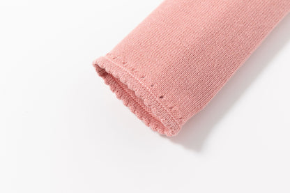 Chaqueta torera de niña en punto, de color rosa maquillaje de Newness - Detalle 6 - Moda Infantil Chicle
