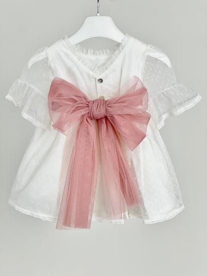 Jesusito con fajín de tul en rosa maquillaje - Coco Acqua 2025 - Detalle 3 - Moda Infantil Chicle