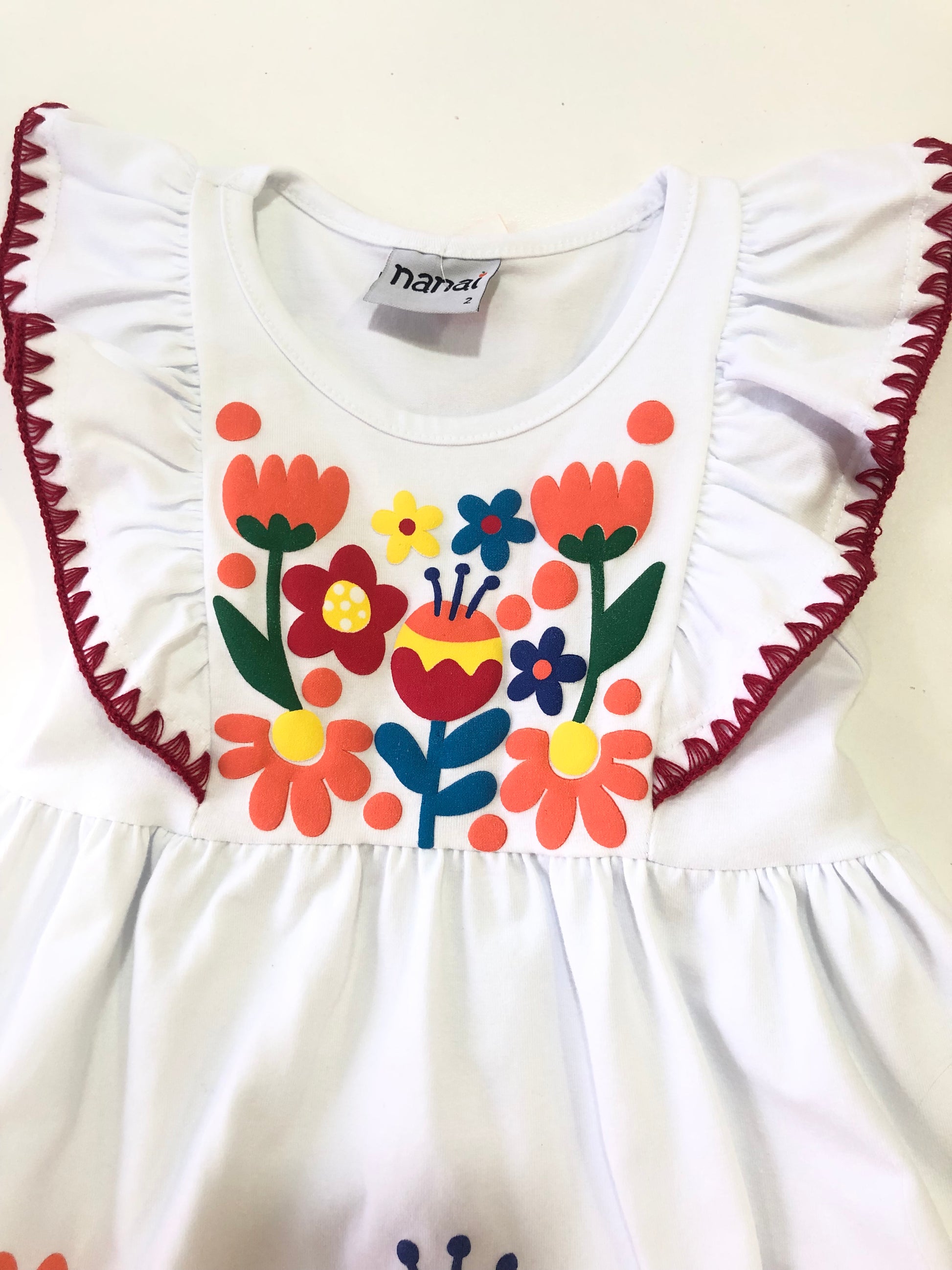 Vestido de niña con flores en relieve - Nanai - Detalle 1 - Moda Infantil Chicle