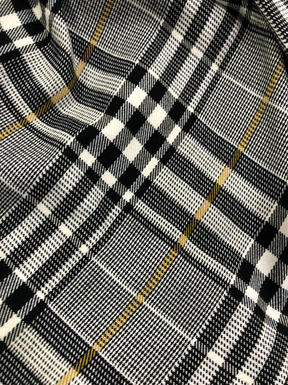 Vestido de niña de cuadros blancos, negros y mostaza - Basmarti de invierno 2024 - Detalle 3 - Moda Infantil Chicle