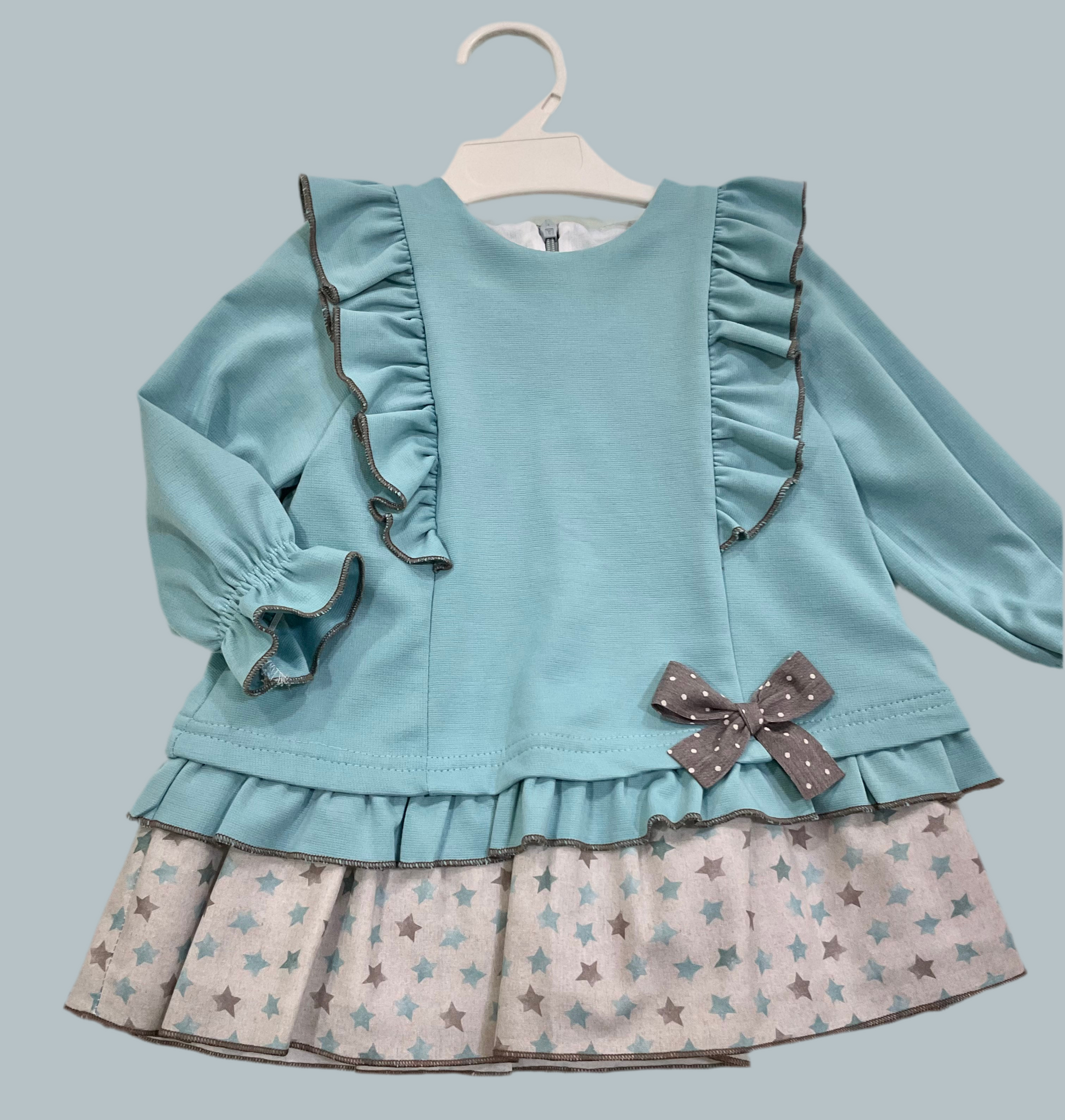 vestido niña bebé en turquesa - Cuka invierno 2024 - Frontal - Moda Infantil Chicle